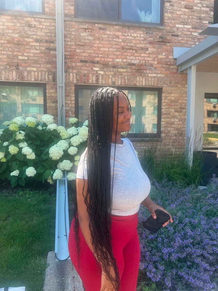 Professional hair braiding salon environment at Mariame Hair Braiding Minneapolis.