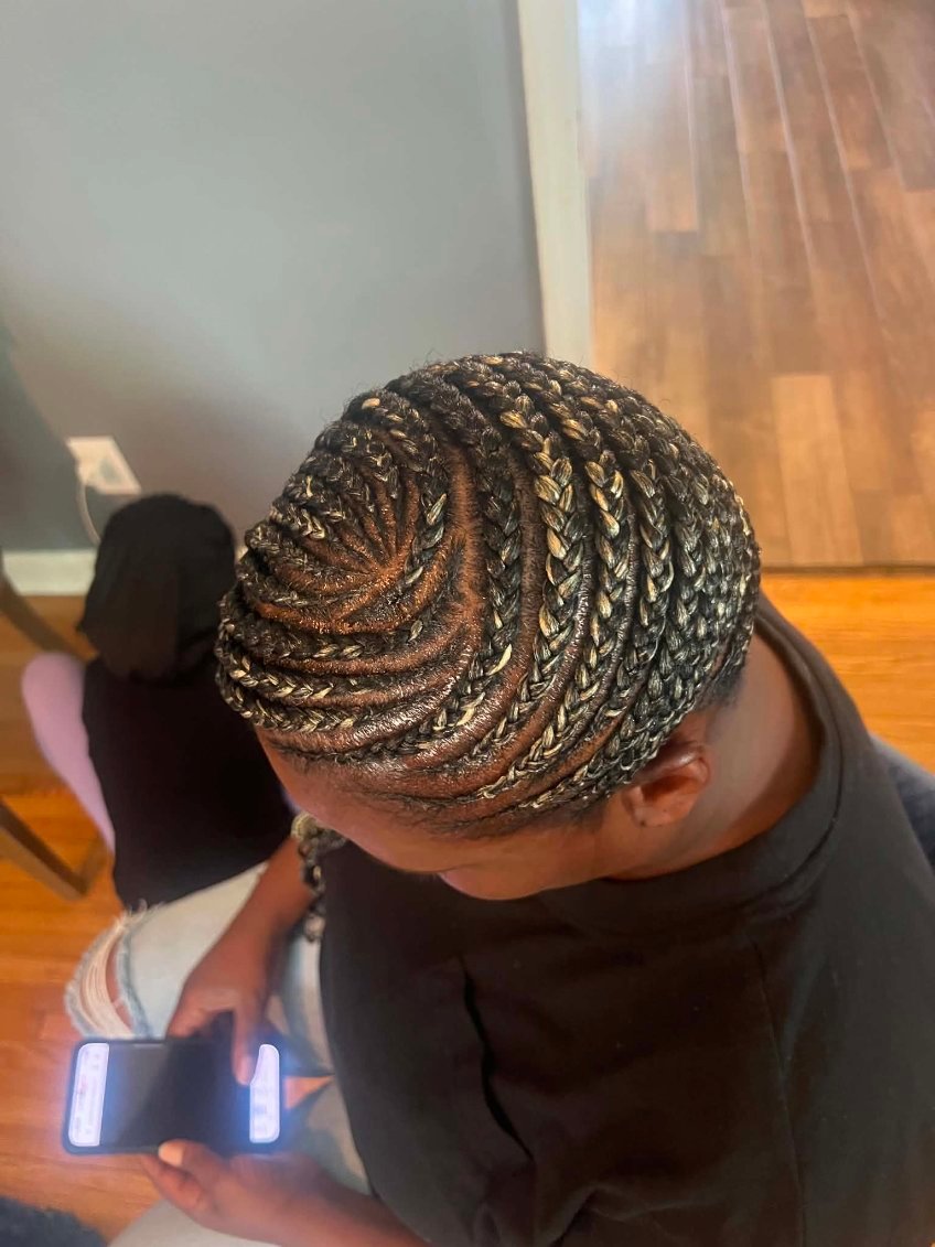 Beautiful box braids styled at Mariame Hair Braiding in Minneapolis.